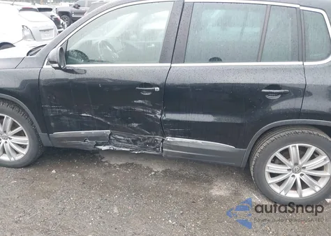 2014 Volkswagen Tiguan Sel from USA, damaged, VIN WVGAV3AX8EW611820